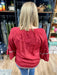 boho style top, with flutter sleeve, tie at neck, embroidery down front and on sleeves, maroon top with flower embroidery