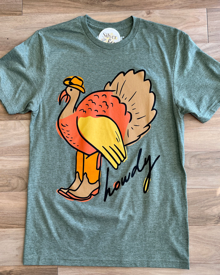 green tee, with hand drawn turkey in cowboy boots and text Howdy